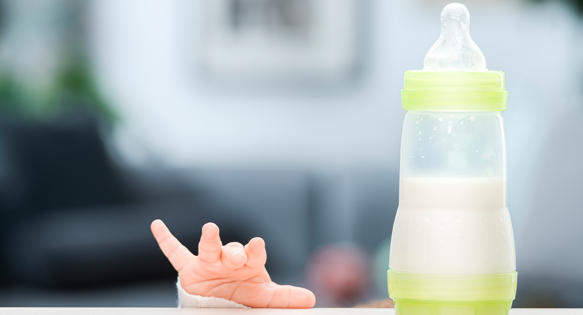 Banner hand and bottle