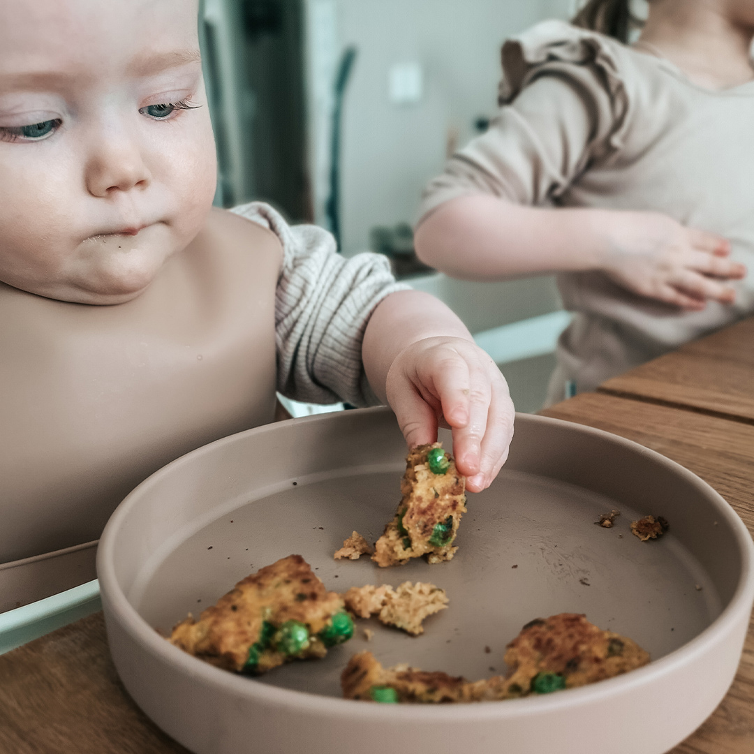 Baby eating fingerfood